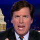 Illustration for article titled Tucker Carlson Challenges Alexandria Ocasio-Cortez To A Date